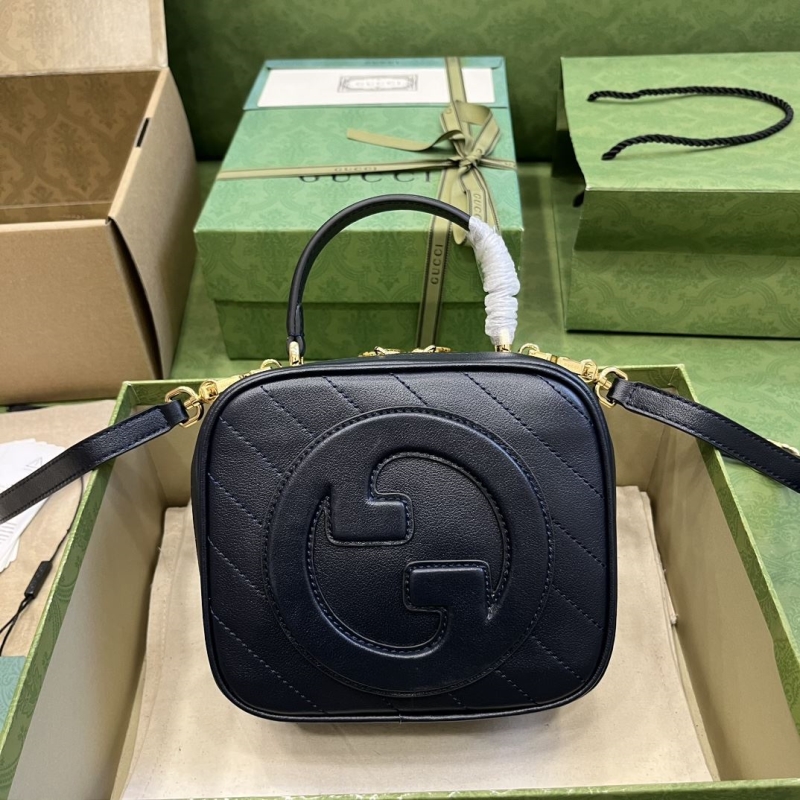 G*u*i top handle bags